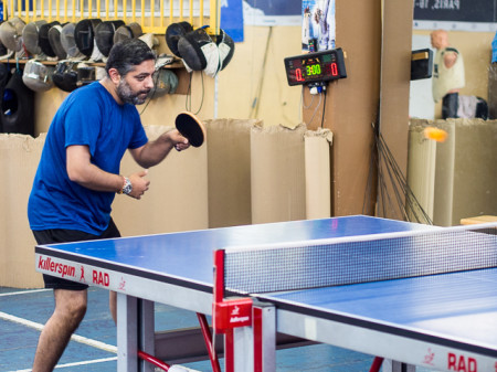 Aashish hits a stylish forehand