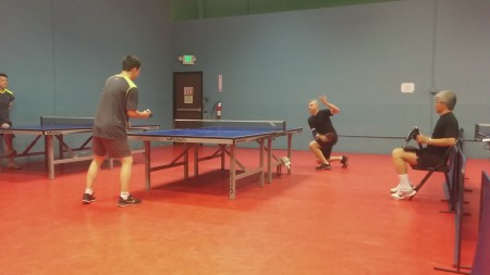 Roger Gorani vs Xiaodong Liu, Tom Liu keeping score, and Perry Chang umpiring