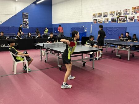 Jayde Tam (serving) vs. Tino Voong (receiving)