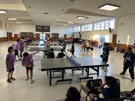 Cici and Joel vs. Amanda and Nathaniel in doubles action